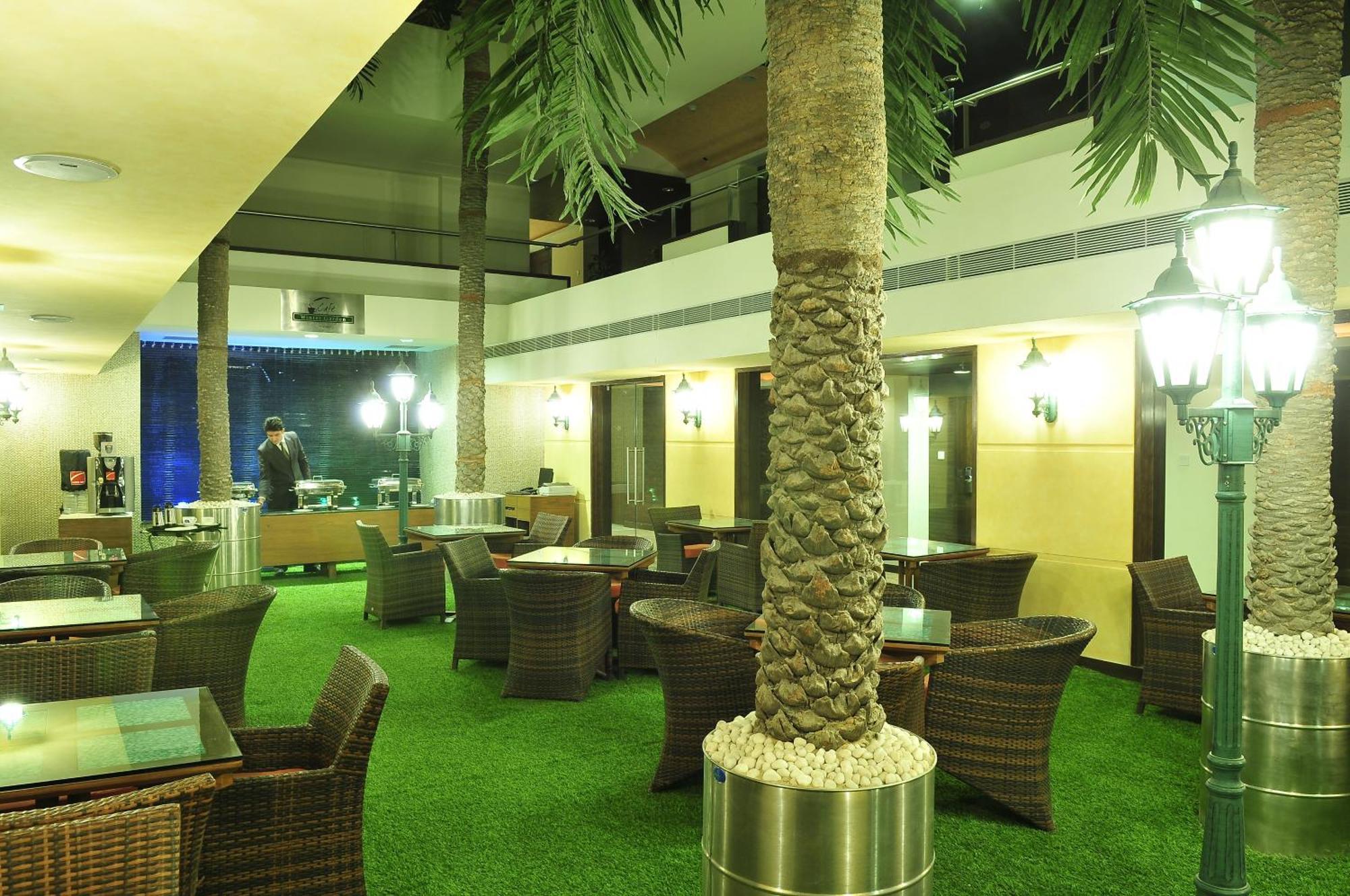 坎贝格朗德酒店 阿穆达巴 餐厅 照片